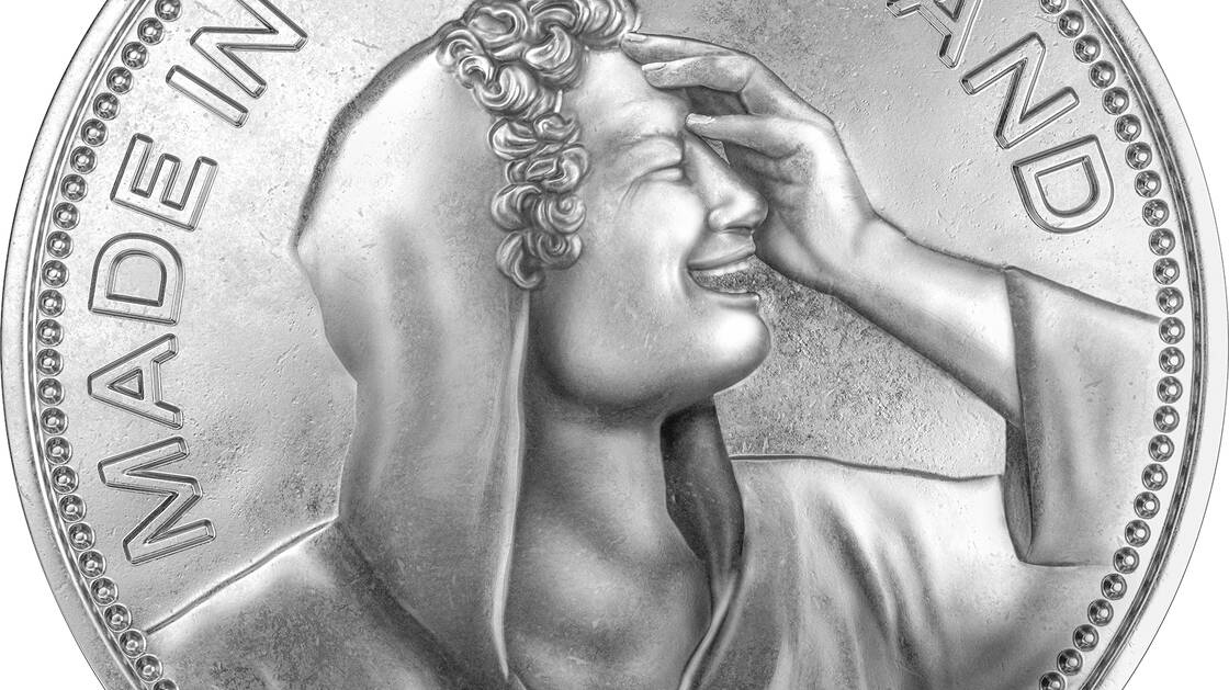Fünflieber-ähnliche Münze mit einem lachenden Portrait und dem Titel "Made in Witzerland"