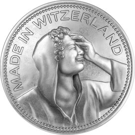 Moneta a cinque livree con un ritratto che ride e il titolo "Made in Witzerland".
