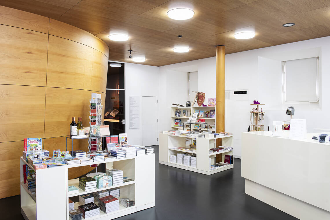 View of the museum shop with a selection of books and other shop items