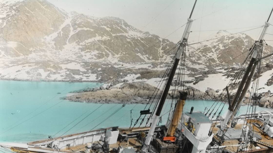 The expedition ship "Fox" under Swiss flag on the Greenland coast, 1912.