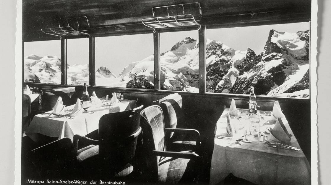 Parlour car of the Bernina Railway with a view of the Bernina massif